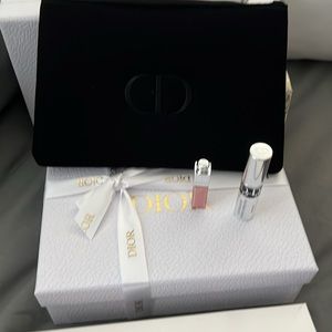 New black, Christian Dior, makeup bag with mascara and small lip gloss maximizer